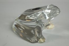A 20th century Baccarat moulded glass model of a seated frog with etched mark to base. H.7cm.