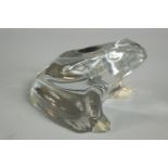 A 20th century Baccarat moulded glass model of a seated frog with etched mark to base. H.7cm.