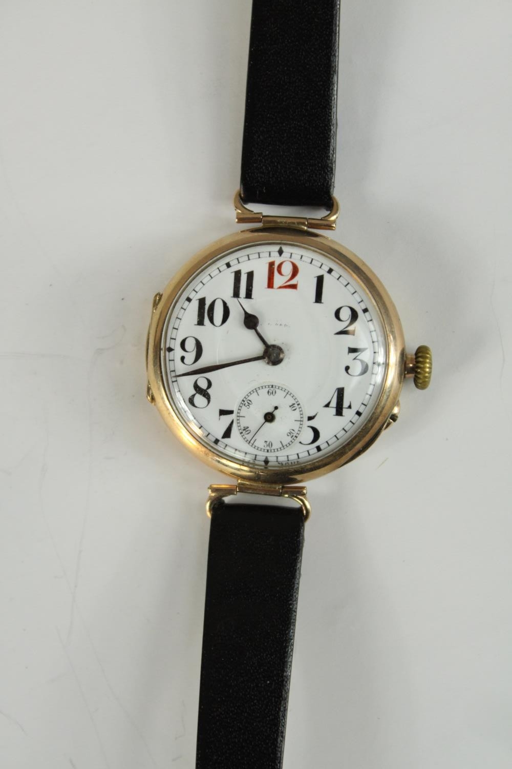 An early 20th century Thomas Russell 9 carat yellow gold cased gentlemen's wristwatch, the white