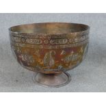 A 19th century Northern Iraqi copper wine bowl with incised decoration. H.30 W.41 D.41cm