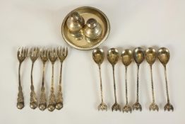 A part set of 800 grade silver spoons and forks cast with floral finials together with a 925 grade