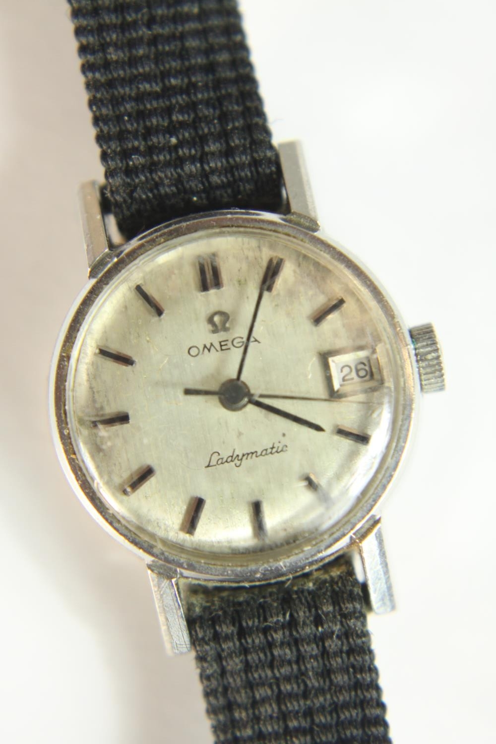 A vintage ladies Omega Ladymatic wristwatch, with baton numerals, sweeping second hand and date