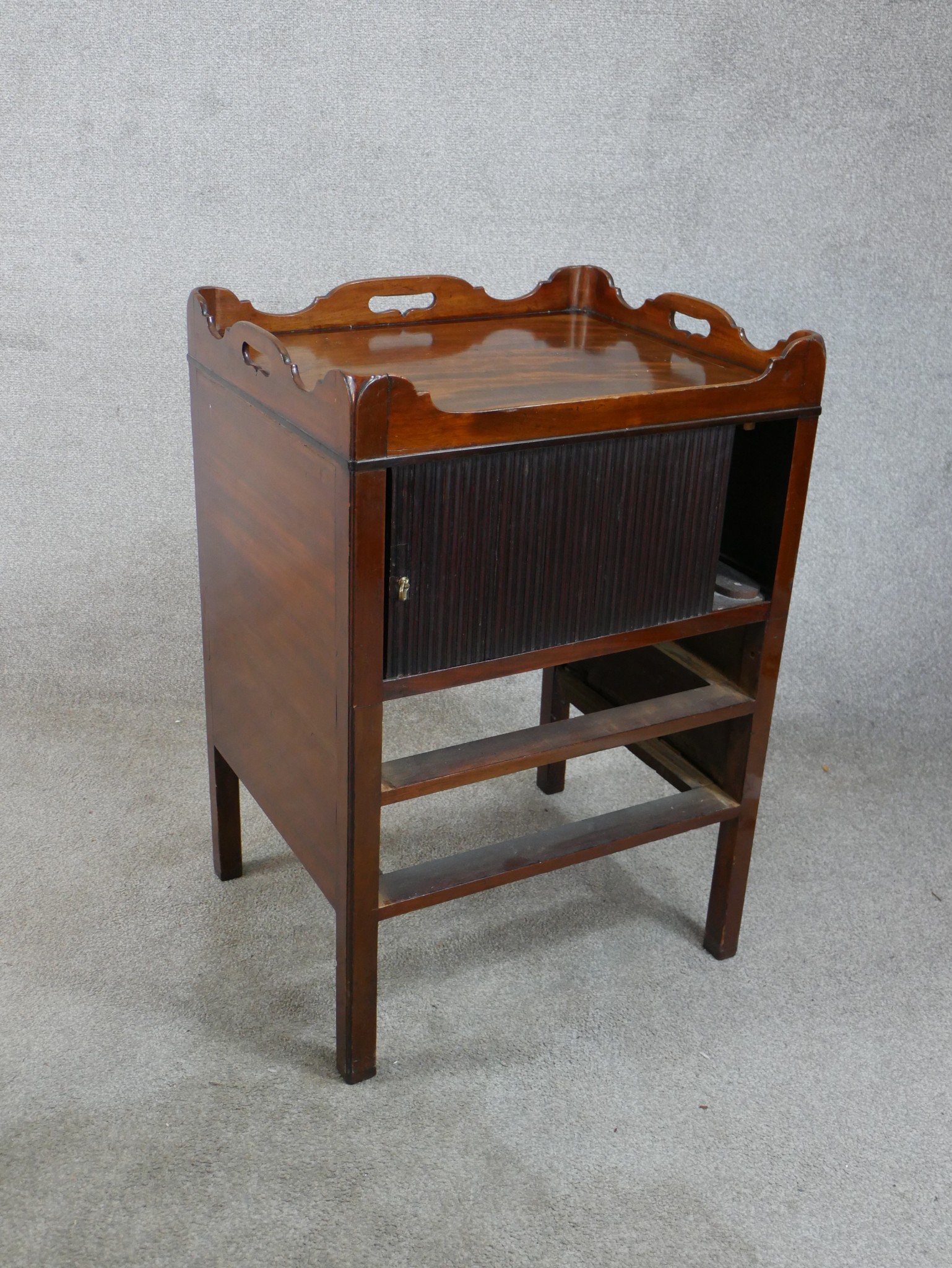 A George III mahogany tambour fronted tray top commode, raised on square tapering supports. H.77 W. - Image 5 of 6