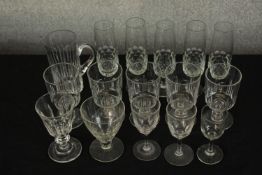 Assorted 19th century and later drinking glasses to include champagne flutes and others. H.7cm (
