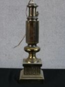 A 19th century cast brass hexagonal telescopic table lamp raised on square base. H.47 W.15 D.15cm