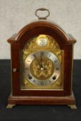 A late 20th century mahogany cased Tempus Fugit dome topped mantle clock, the brass and silvered