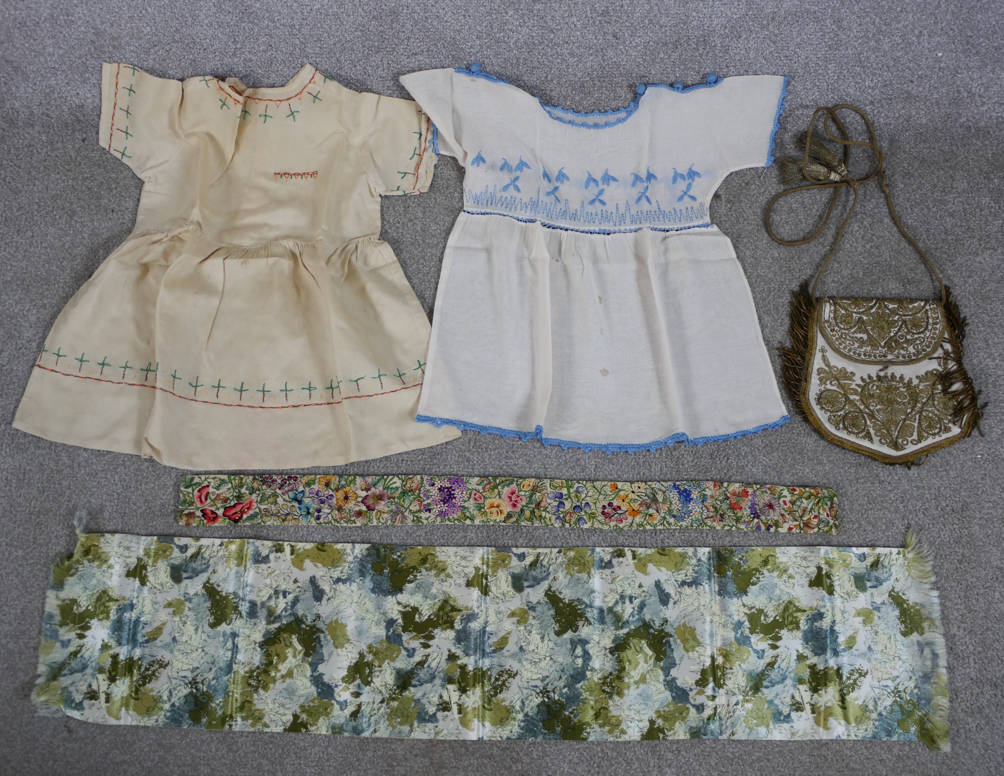 Two 19th century handmade childs dresses together with a gold thread embroided and various floral