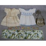 Two 19th century handmade childs dresses together with a gold thread embroided and various floral