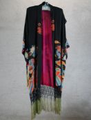 A 20th century Japanese embroidered silk kimono with tassel edging. H.136 W.44cm