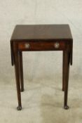 A 19th century small mahogany dropleaf table with single drawer, brass swing handles raised on