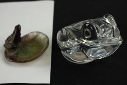 A 20th century Daum clear glass seated toad, marks to base together with a Daum pate-de-verre