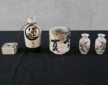 A 20th century Japanese pottery Saki set, together with a small pair of 20th century Chinese