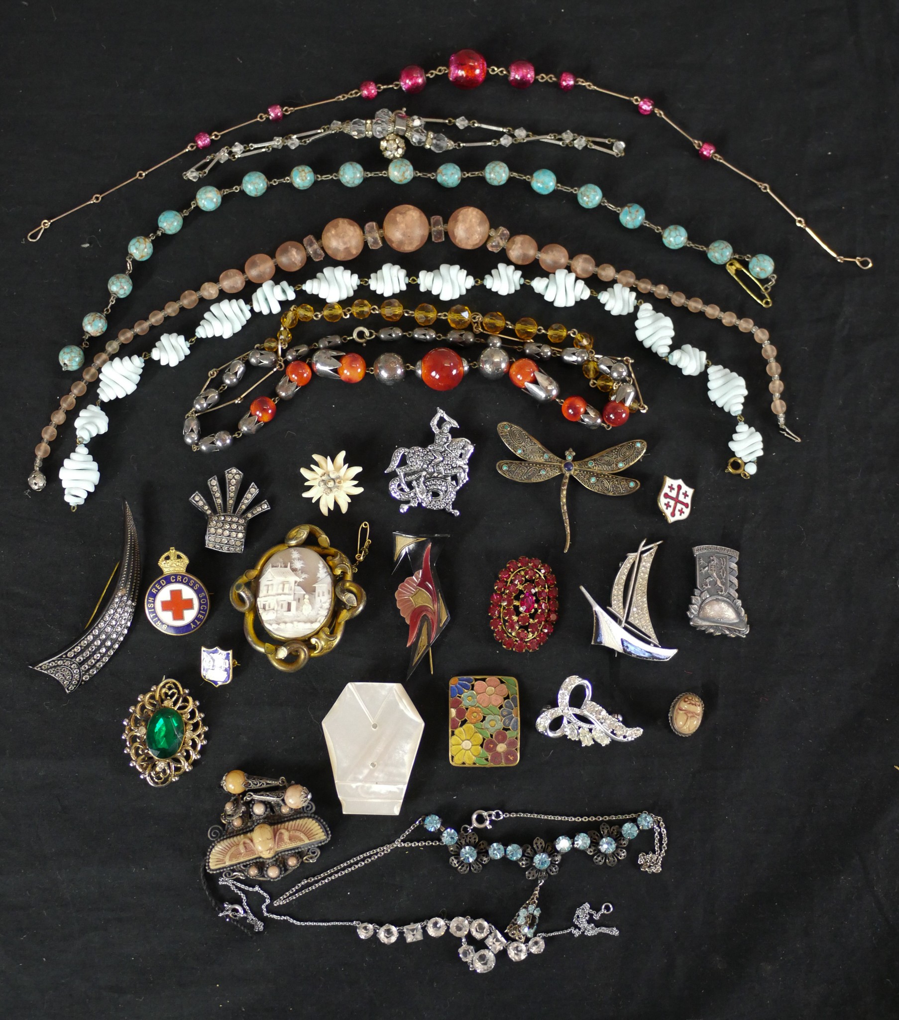 A collection of costume jewellery, including venetian foil necklaces, French paste jewellery and