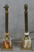 A matching pair of 20th century onyx and gilt metal mounted square table lamps. H.64 W.40 D.30cm