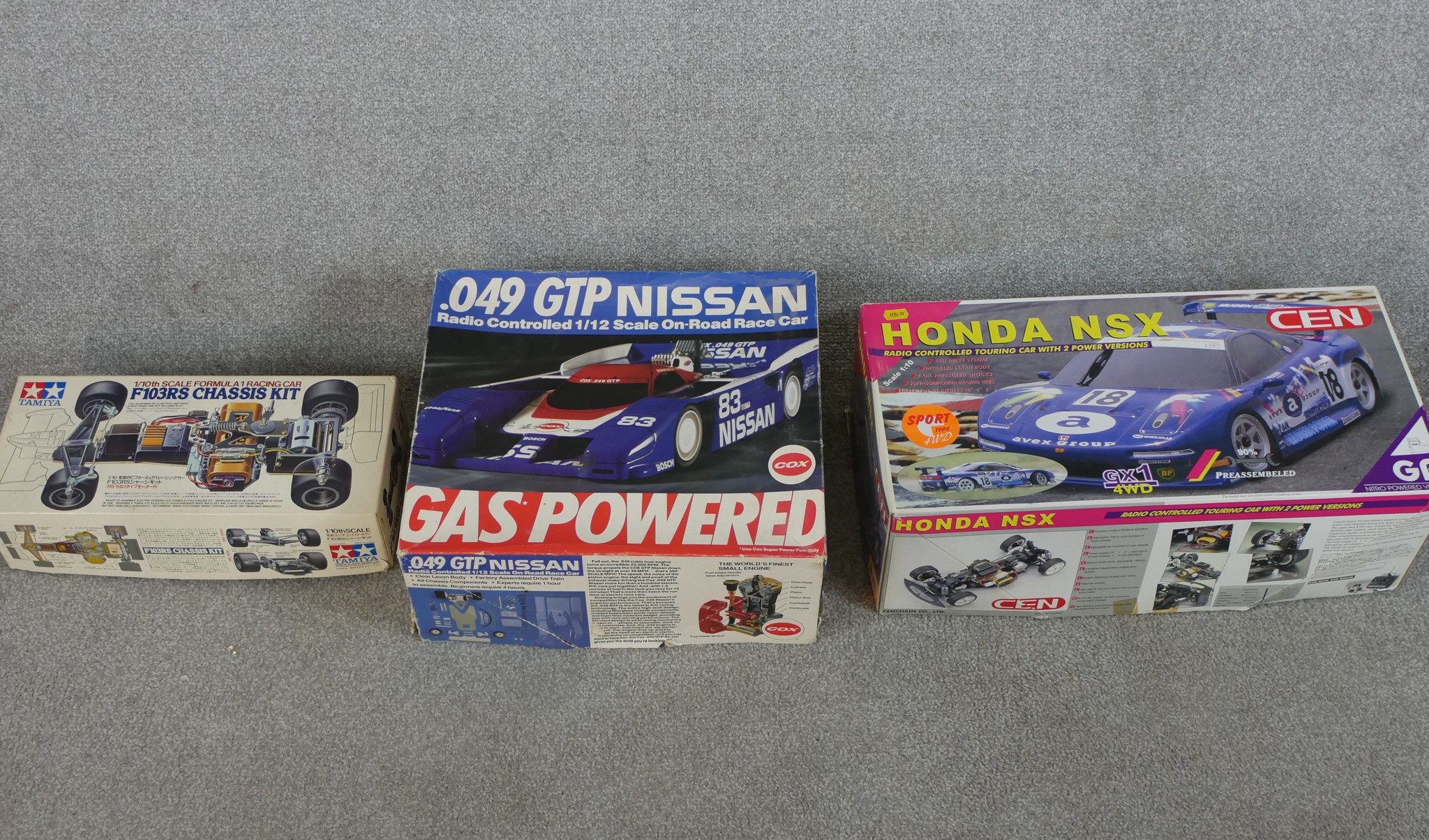 Three boxed scale model cars to include Tamiya 1:10 F103RS Chassis kit, Nissan 93 Cox racing car & - Image 2 of 7