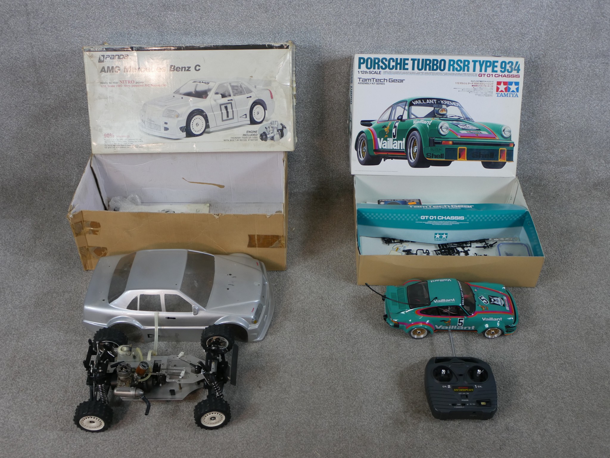 Two boxed scale model cars to include Panda 1:10 AMG Mercedes Benz & Tamiya 1:12 Porsche Turbo RSR