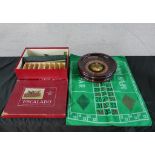 A 20th century boxed Escalado game, complete with mat and accessories, together with a small