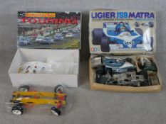 Two boxed model scale model cars, Tamiya Ligier JS9 Matra together with a 1:10 scale model