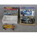 Two boxed model scale model cars, Tamiya Ligier JS9 Matra together with a 1:10 scale model