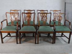 A set of eight 20th century mahogany framed pierced splat back dining chairs each with green