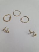 Three pairs of 9ct gold earrings and a single engraved 9ct rose gold hoop earring. The two pairs