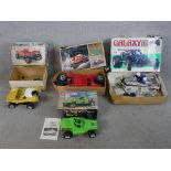 Five boxed scale model vehicles including 1:10 Robbe Baja-Bug, a 1:10 Peanuts Racer, a 1:10 Safari