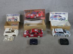 Three boxed scale model cars to include Tamiya 1:10 Willy's Wheeler Honda City Turbo, Tamiya 1:10