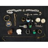 A collection of costume jewellery, including a Thai niello silver brooch of a royal barge, a Max
