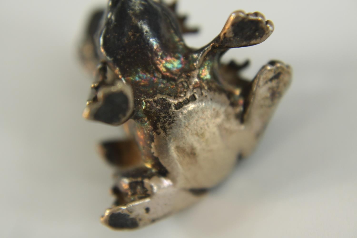 A pair of mating silver frogs along with a painted pewter frog on a rock. H.4cm. (largest) - Image 11 of 11