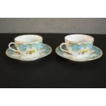 A boxed set of two Royal Worcester Primula pattern tea cups and saucers. Maker's mark to base. (