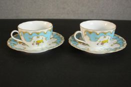 A boxed set of two Royal Worcester Primula pattern tea cups and saucers. Maker's mark to base. (