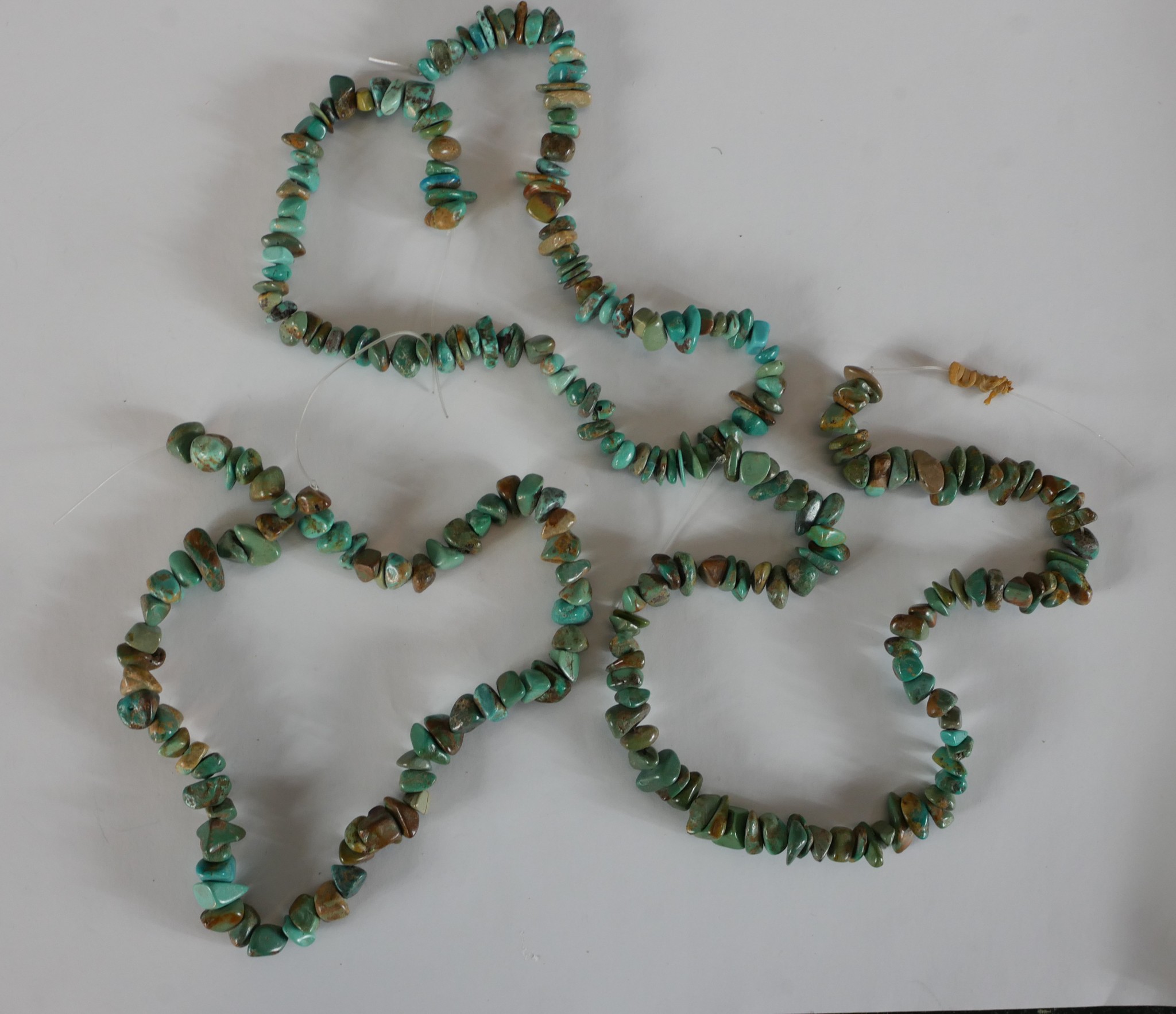 A collection of eight strings of turquoise chips, nuggets and polished round beads. 40cm longest - Image 2 of 7