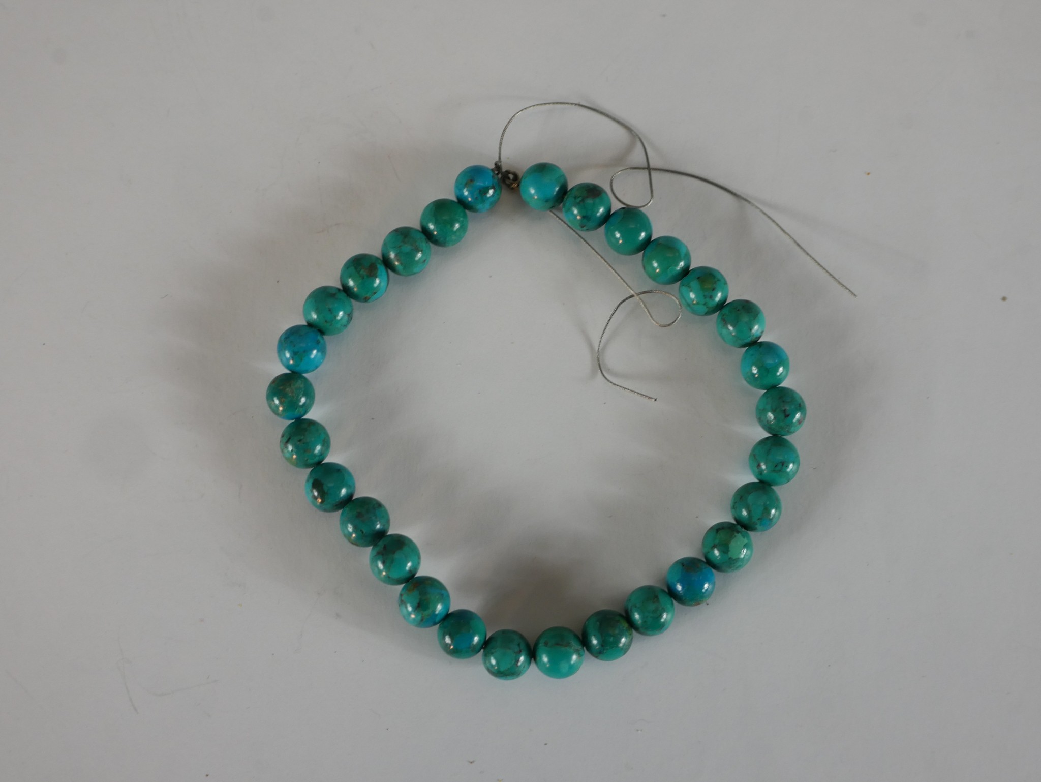 A collection of eight strings of turquoise chips, nuggets and polished round beads. 40cm longest - Image 4 of 7