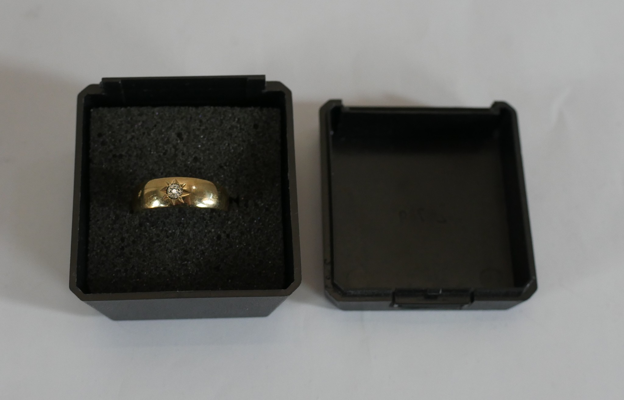 A 9ct gold diamond set band, the eight cut diamond in a star cut setting. Hallmarked:375, Sheffield, - Image 4 of 4