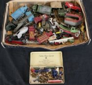 Assorted playworn die cast model cars together with die cast accessories and other models.