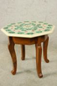 A 19th/early 20th century Indian octagonal specimen topped occasional table set with malachite and