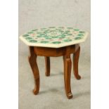 A 19th/early 20th century Indian octagonal specimen topped occasional table set with malachite and