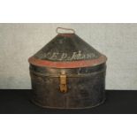 A 19th century painted metal hat box presented Captain E. P. Johnson. H.38 W.40cm.