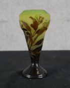 An early 20th century Galle style green overlaid tapering cameo glass vase with incised floral