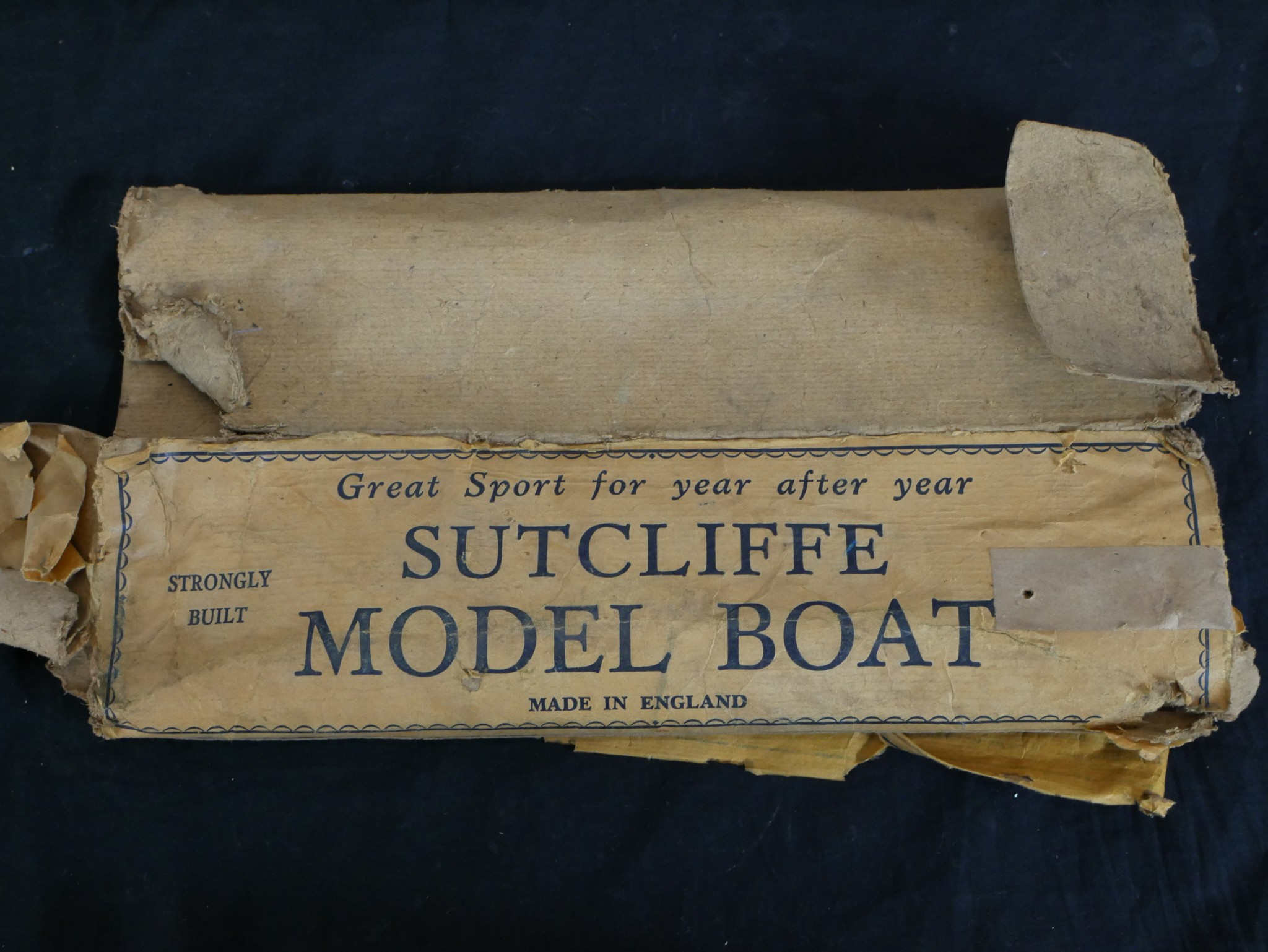 A 20th century boxed Sutcliffe painted model boat. H.9 W.41 D.10cm - Image 3 of 3