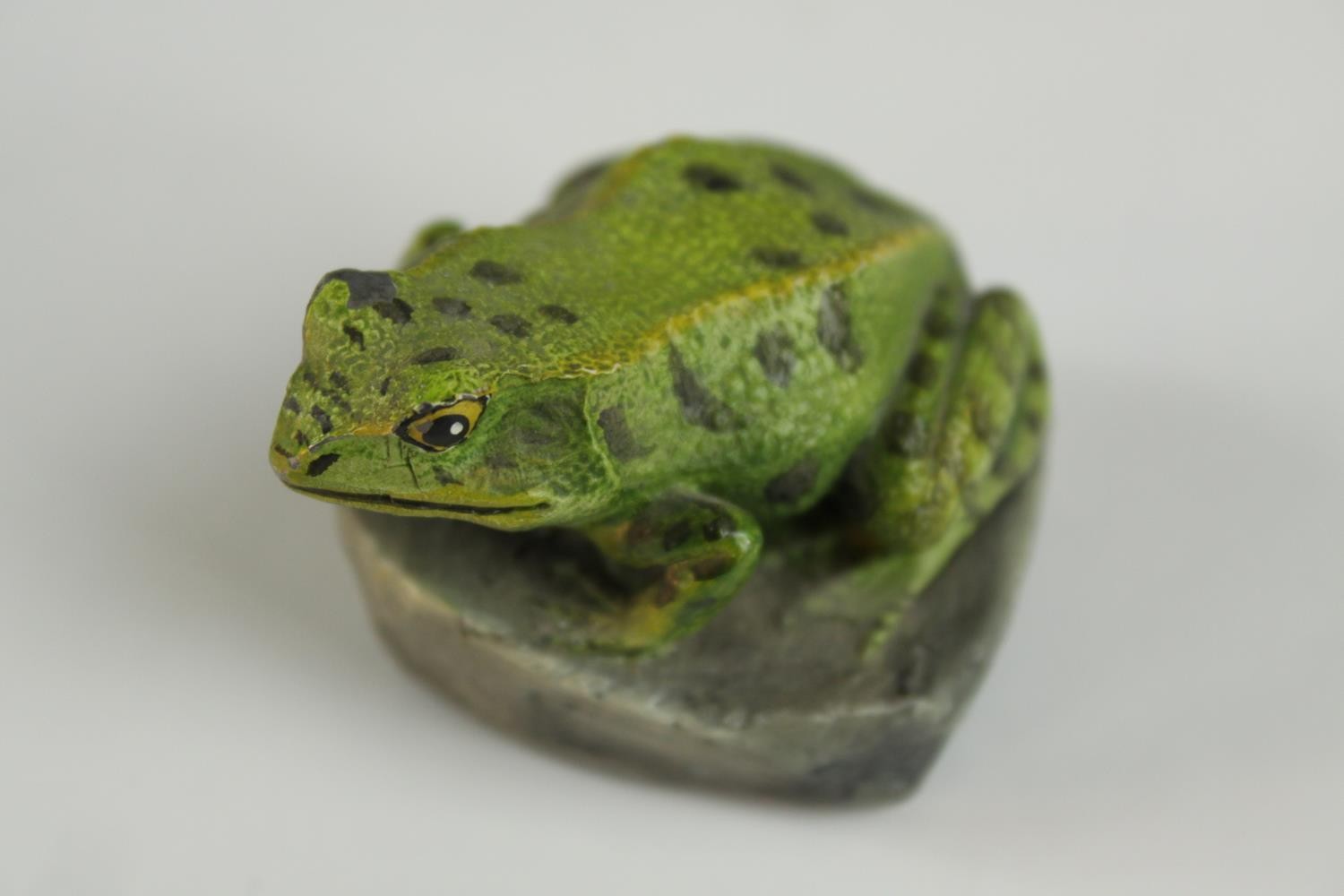 A pair of mating silver frogs along with a painted pewter frog on a rock. H.4cm. (largest) - Image 4 of 11