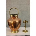 A 19th century Gothic Revival style brass candlestick, the central column with diamond knop raised