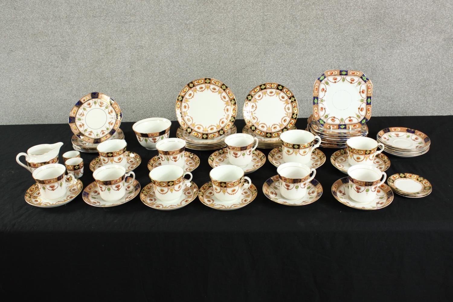 Two 20th century Sutherland China part tea and dinner sets decorated with sprays of flowers, marks