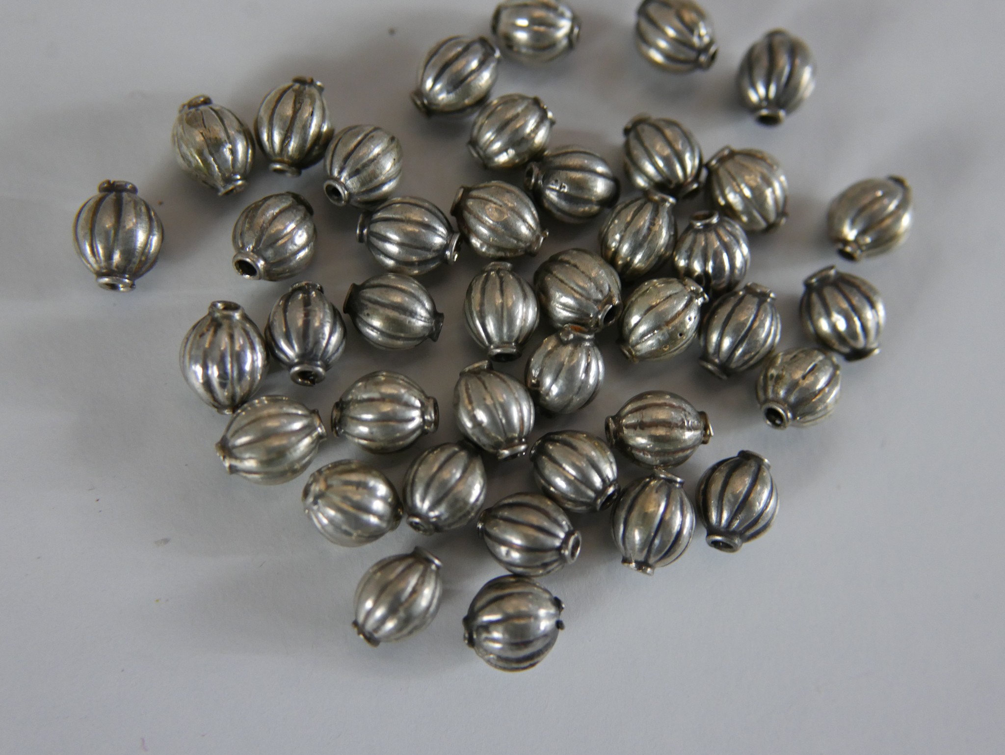 Six bags of white metal (tests as silver) beads, various designs and sizes of beads. H.1 W.1cm - Image 2 of 8