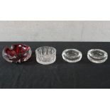 A pair of Murano clear heavy glass ash trays together with two other glass ashtrays. H.6 W.16 D.10cm