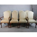 A set of eight mahogany framed dining chairs to include single chairs and two open arm carvers