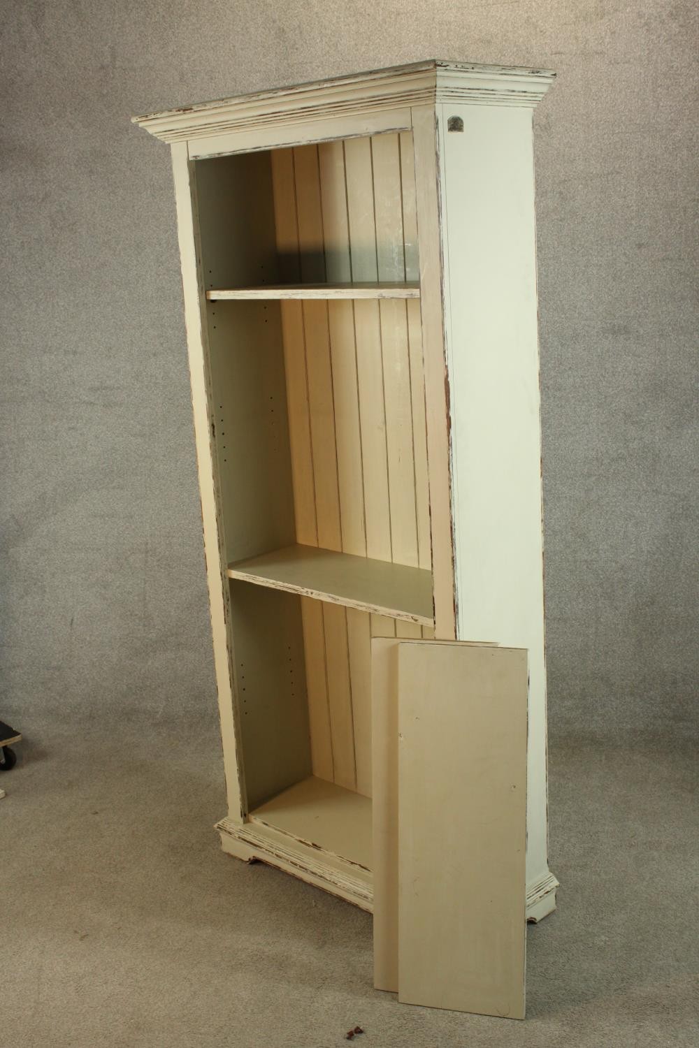A contemporary painted pine open bookcase raised on shaped bracket feet. H.180 W.90 D.35cm. - Image 3 of 4