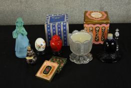 Various Chanel and other glass novelty scent bottles together with an Avon candle holder. H.16cm. (