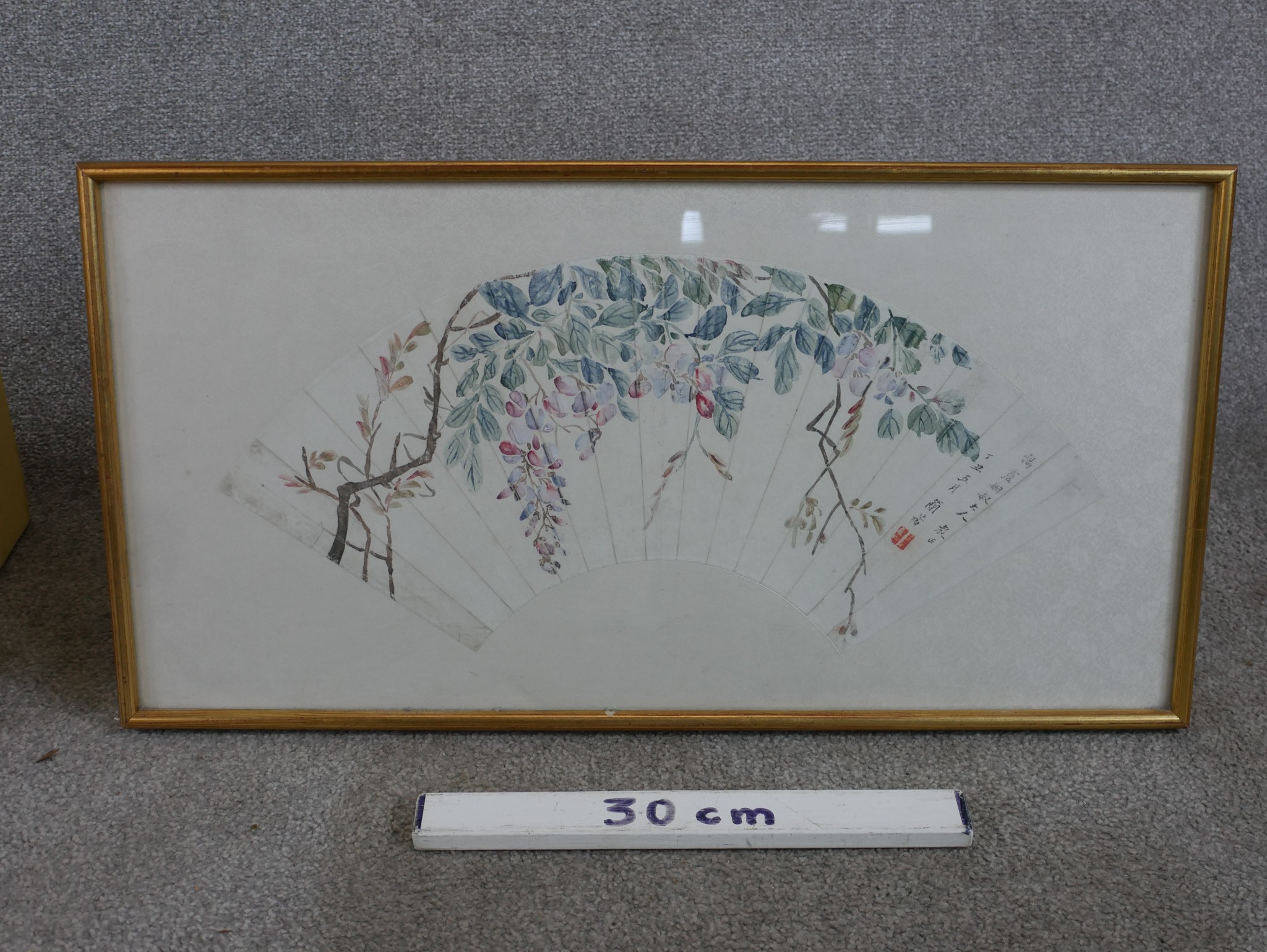 A 20th century hand coloured Japanese fan, with calligraphy and seal mark, framed. H.34 W.64 - Image 3 of 3