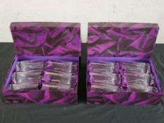 Twelve boxed cut crystal high ball glasses. H.9 W.33 D.25cm